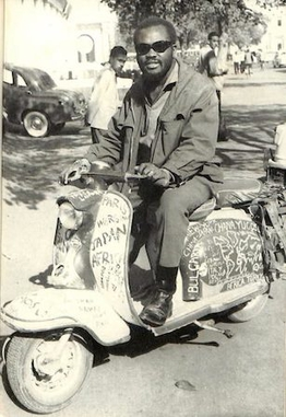 Olabisi Ajala on his scooter