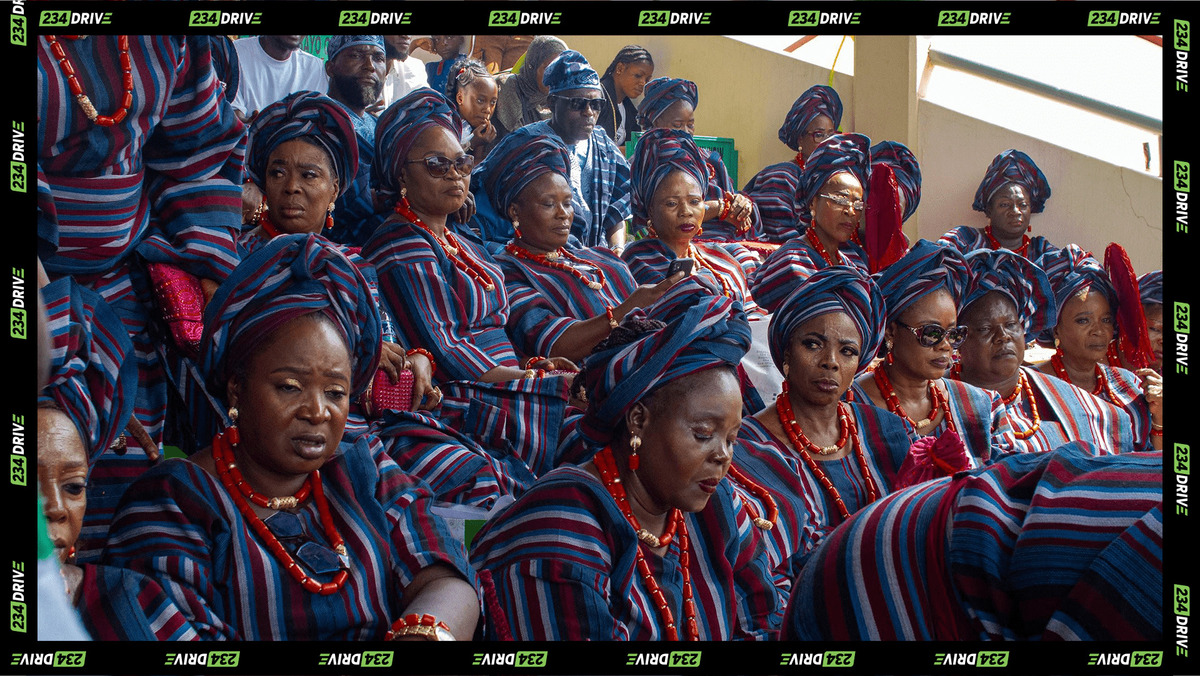 Women in a Regberegbe elegantly dressed in traditional Aso-Oke attire at Ojude Oba