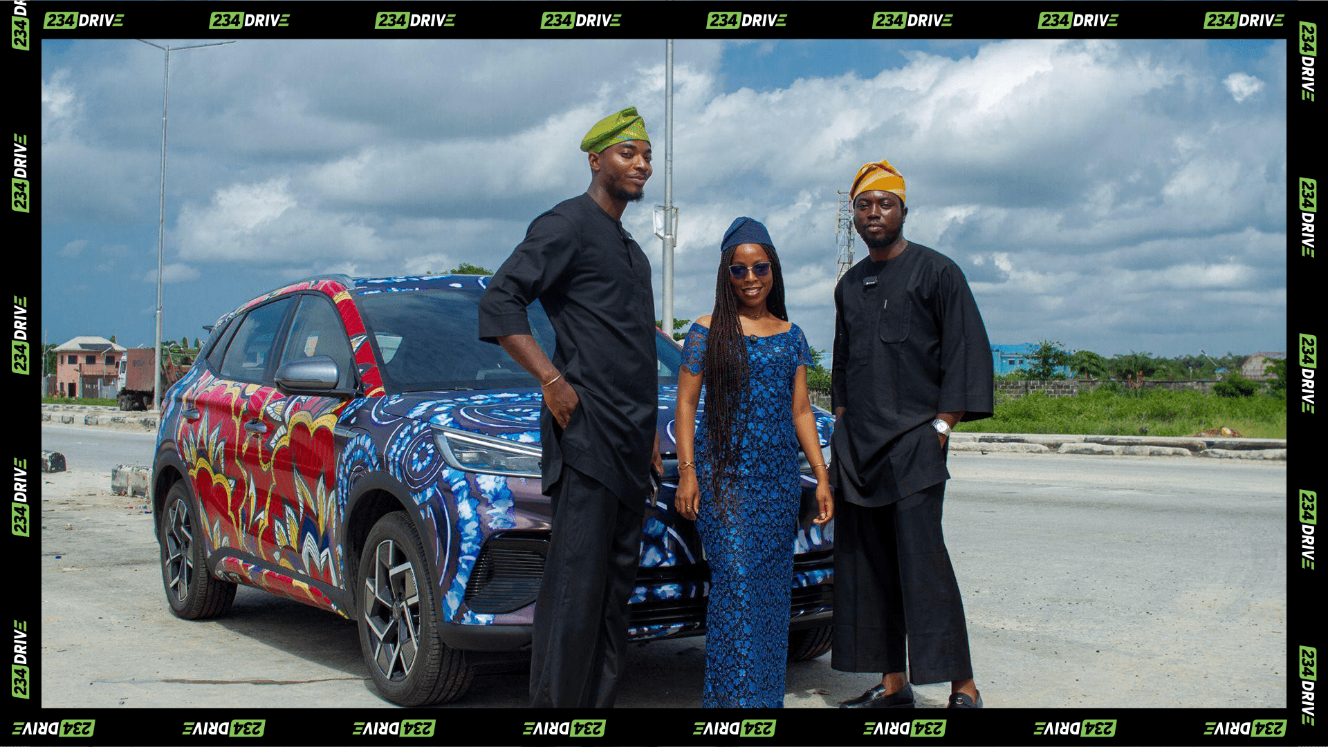 L-R: Richie, Olamide, and Crank posing with the BYD Atto 3