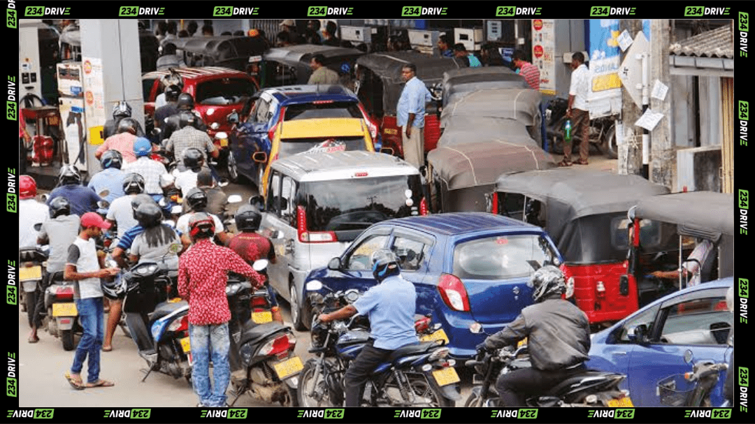 Long lines of motorcycles, cars, and tricycles crowd a fuel station at Abuja due to scarcity of PMS | Source: Punch
