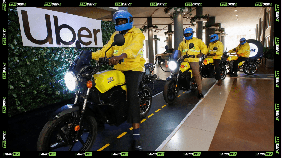 Uber riders display the company’s electric boda fleet in Kenya, showcasing its push toward cleaner two-wheel transport.