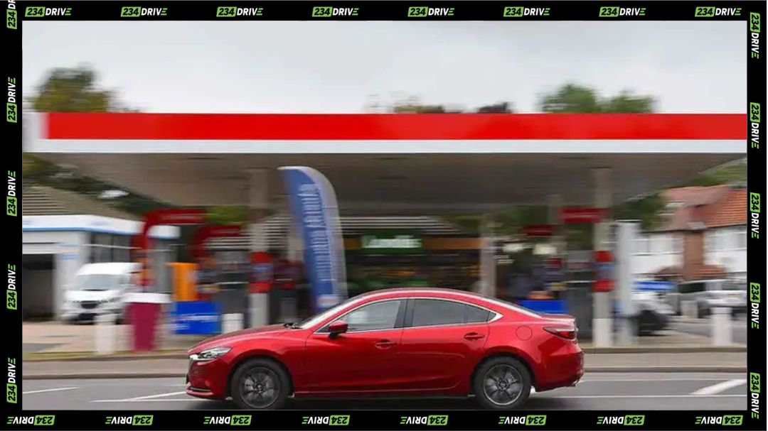 Mazda 6 Driving past a petrol Station. Source: What Car