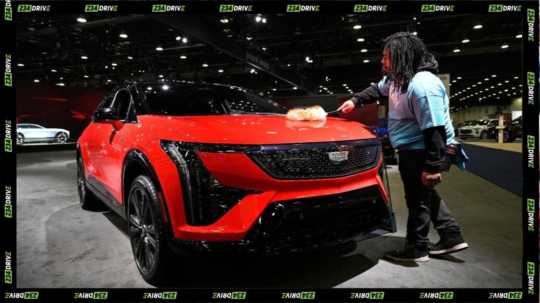 A worker dusts on a 2026 Cadillac Optiq Premium Sport vehicle at the Detroit Auto Show, Wednesday, 14 Jan. , 2026, in Detroit. (AP Photo/Jose Juarez). Source: US News