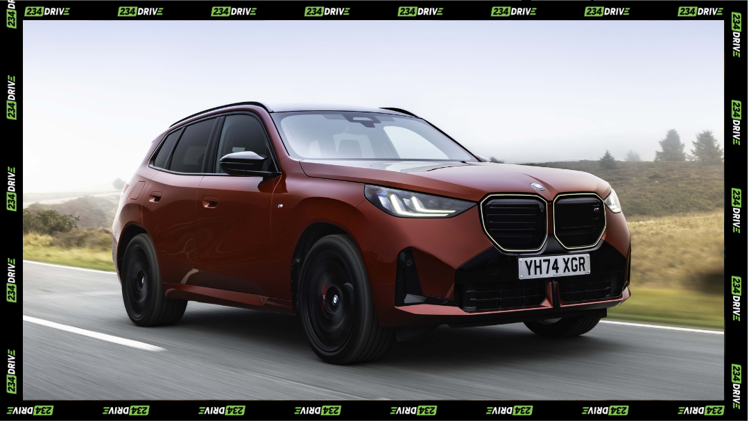 A BMW X3 drives at speed, showing the sleek, high-value SUV style