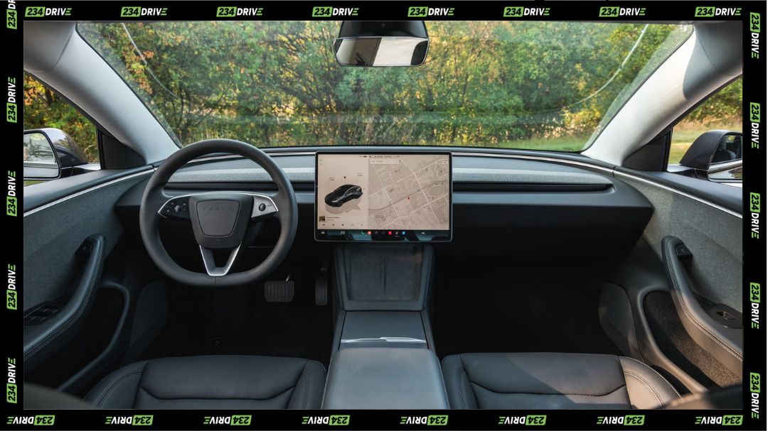 Tesla Model 3 Long Range AWD Interior. Source: Car and Driver