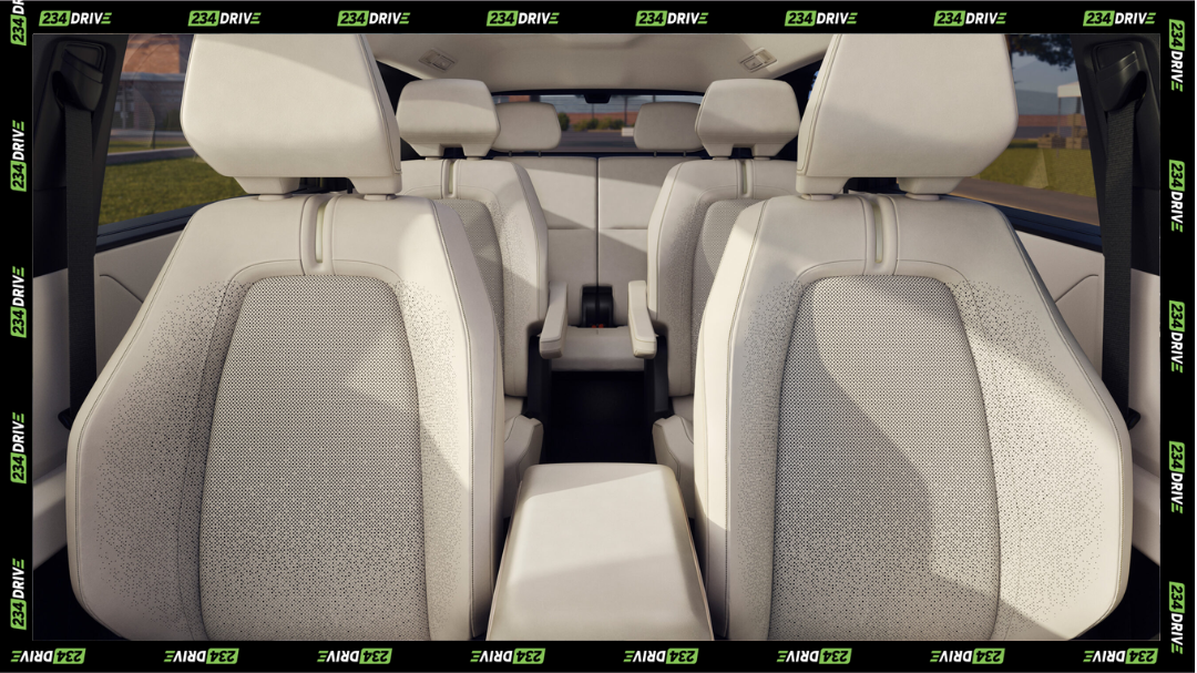 Light-colored seats and a spacious three-row layout create an open, comfortable feel throughout the interior, There are 18 cupholders, tablet slots behind the front seats, layered console storage, and a hands-free power liftgate for quick loading.