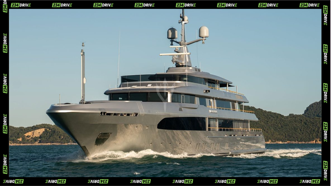 Superyacht Regina D’Italia cruising through open waters, showcasing her sleek 213-foot steel-and-aluminum profile.