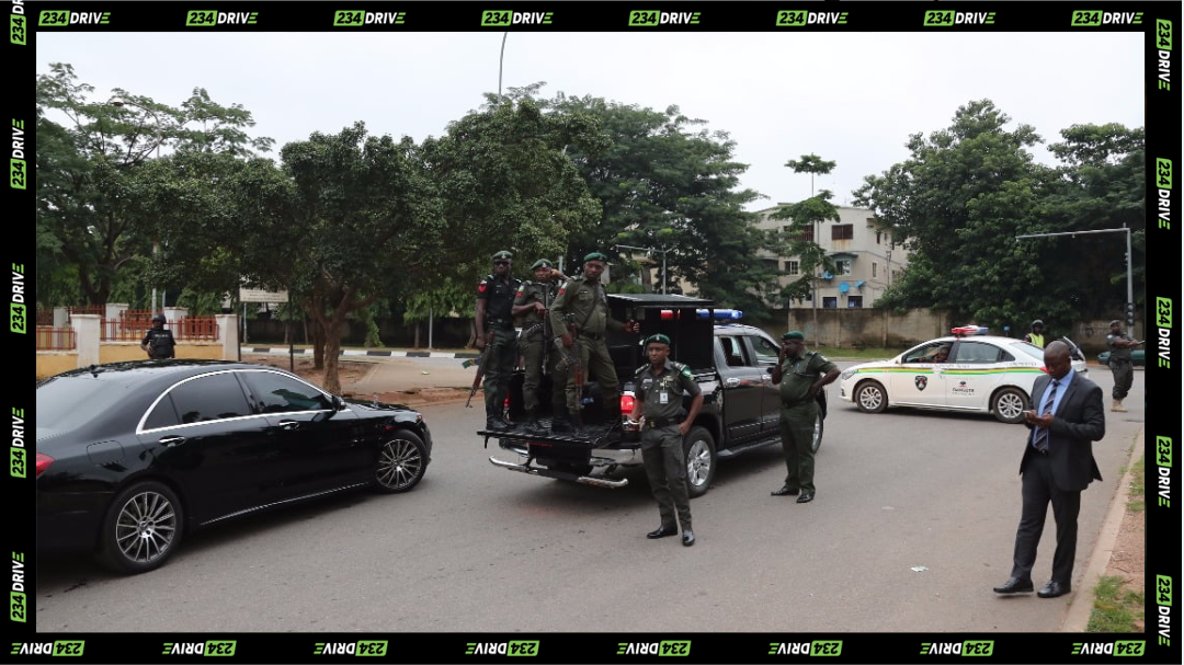 Hired cars were once commonly escorted by police or security personnel, showing how safety shaped premium travel at the time