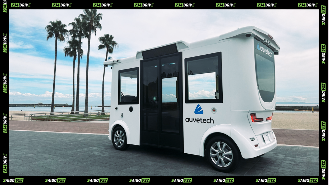 An Auve Tech MiCa autonomous shuttle parked by the roadside.