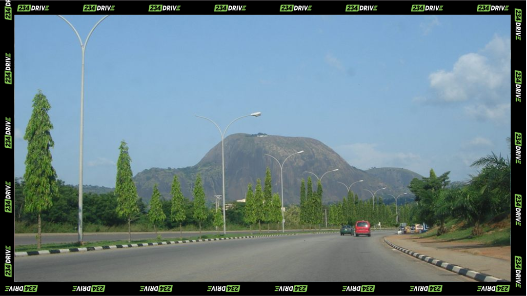Abuja’s long roads are slowly adding private cars to the transport mix as fuel prices increase