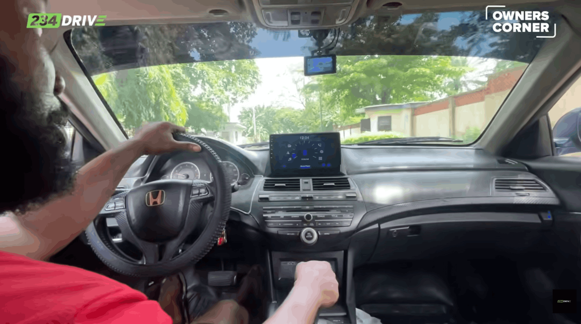 Bugsy drives his Honda Accord Coupe as the dashboard camera and aftermarket entertainment screen support his everyday trips around Lagos.