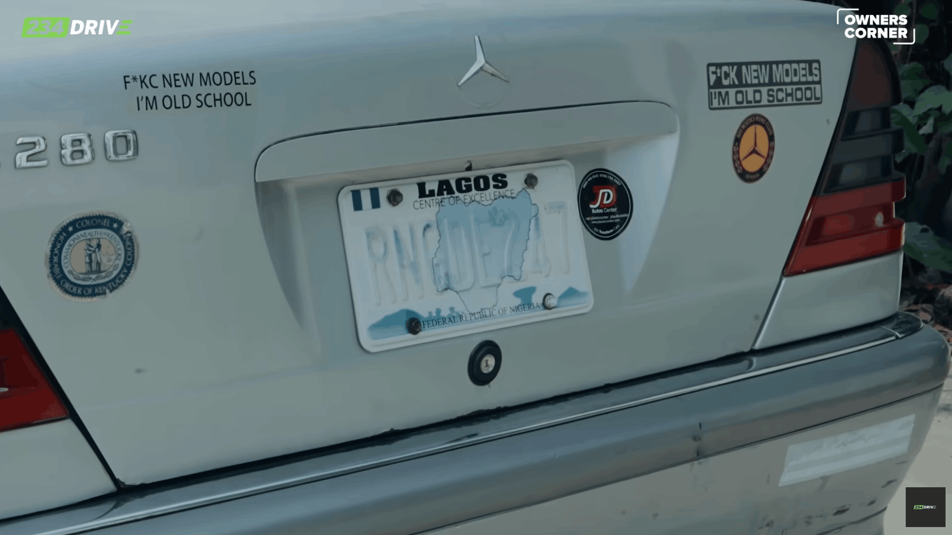 The rear of Renegade’s Mercedes-Benz C280 displays its badge, Lagos plate and old-school stickers in 234Drive Owner’s Corner.