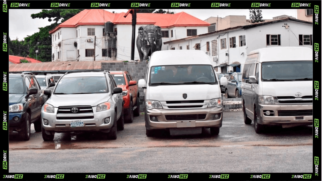 Recovered Toyota vehicles and buses parked at a Lagos police facility during an investigation into a ₦1.02 billion vehicle fraud syndicate.