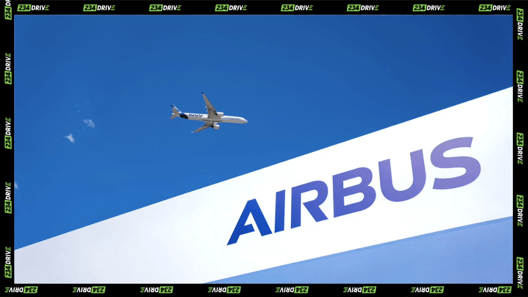 Airbus aircraft flies over a branded company display as Morocco expands aerospace manufacturing, engineering skills and aviation infrastructure for global supply chains.