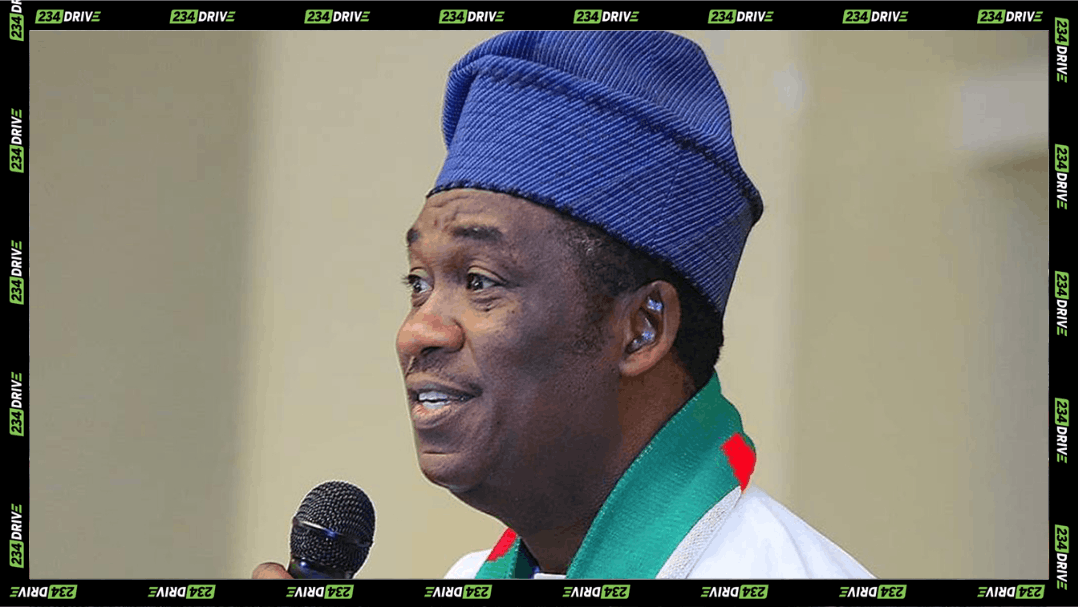 Lagos Deputy Governor and 2027 governorship candidate Obafemi Hamzat holds a microphone as debate grows over his crackdown on roadside car spotting.