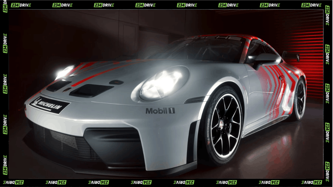 Porsche displays the 2027 911 Challenge race car in silver and red, highlighting its GT3-based body, front aerodynamics and circuit-ready design.