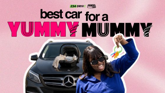 Tola smiling in sunglasses holding toy keys beside a black Mercedes-Benz GLE with a baby car seat on the bonnet