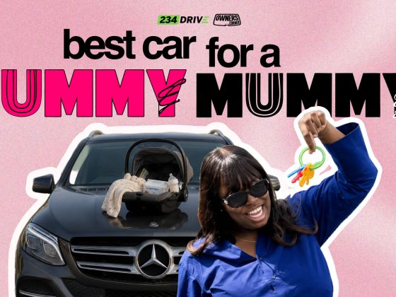 Tola smiling in sunglasses holding toy keys beside a black Mercedes-Benz GLE with a baby car seat on the bonnet
