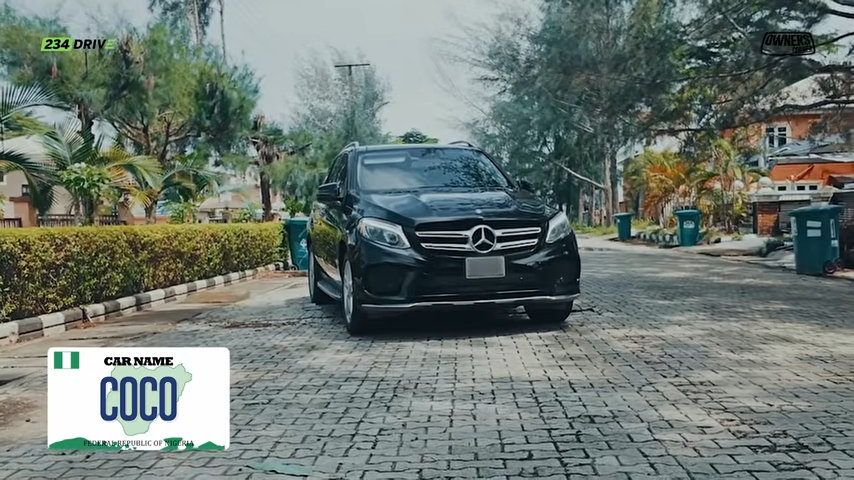 Front view of Tola Badmus’s black Mercedes-Benz GLE 350 next to a Nigerian number plate graphic reading Coco