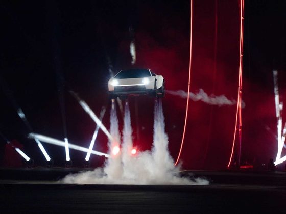 Tesla's rocket-powered Roadster prototype executing a short hop during its high-performance debut in Texas