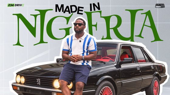 Ameen leans on his black 1987 Peugeot 505 in front of large "Made in Nigeria" text