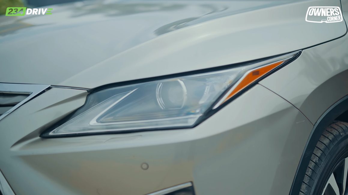 Close-up of the Lexus RX350’s headlight and sharp front-end styling